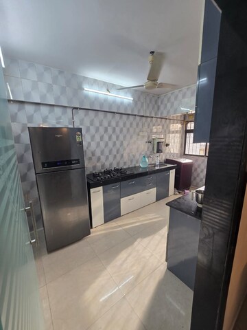 Kitchen in 2 BHK Apartment at Vile Parle West – for Rent