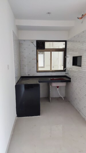 Kitchen in 1 BHK Apartment at Chandak Nishchay Wing E, Borivali East – for Rent