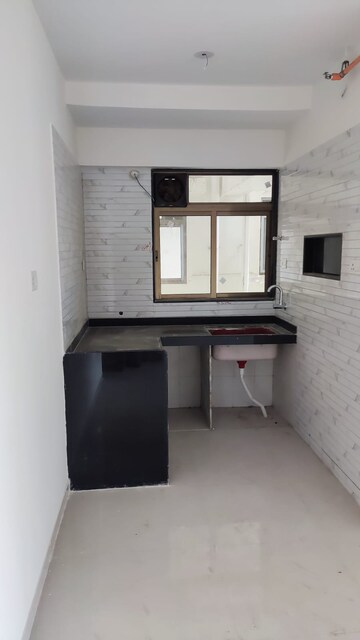 Kitchen in 1 BHK Apartment at Chandak Nishchay Wing E, Borivali East – for Rent