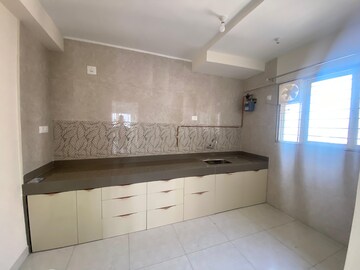 Kitchen in 2.5 BHK Apartment at Nanded City Sur, Nanded – for Rent