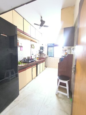 Kitchen in 3 BHK Apartment at Vikas Park CHS, Malad West – for Rent