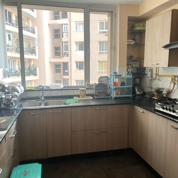 Kitchen in 2 BHK Apartment at Unitech Escape, Rosewood City – for Sale