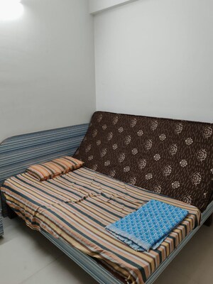 Bedroom in 2 BHK Apartment at Kumar Pebble Park, Hadapsar – for Rent