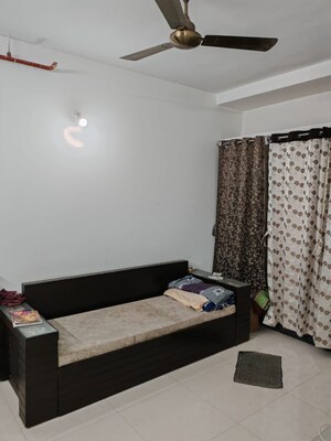 Bedroom in 2 BHK Apartment at Kumar Pebble Park, Hadapsar – for Rent