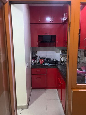 Kitchen in 2 BHK Apartment at Ajnara Le Garden, Sector 16b Greater Noida – for Sale