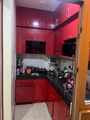 Kitchen in 2 BHK Apartment at Ajnara Le Garden, Sector 16b Greater Noida – for Sale