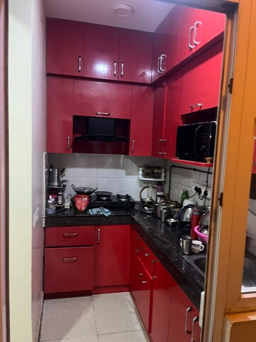 Kitchen in 2 BHK Apartment at Ajnara Le Garden, Sector 16b Greater Noida – for Sale