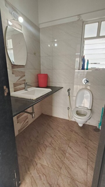 Bathroom in 2 BHK Apartment at Kolte Patil Langston, Kharadi – for Rent
