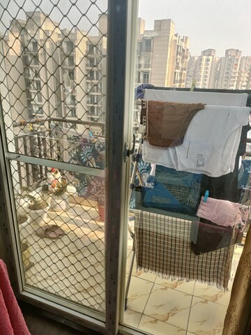 Balcony in 2.5 BHK Apartment at AIMS Golf Town, Sector 4 Greater Noida – for Sale