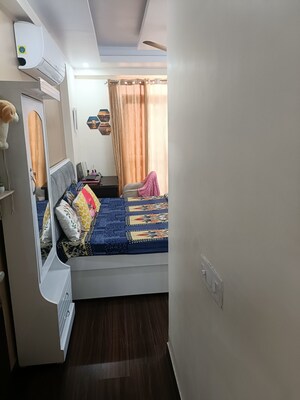 Bedroom in 2.5 BHK Apartment at AIMS Golf Town, Sector 4 Greater Noida – for Sale