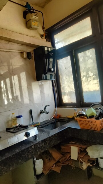 Living Room in 1 BHK Apartment at Kunj Vihar, Santacruz East – for Rent