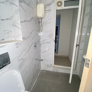 Bathroom in 2 BHK Apartment at Lodha Codename Premier, Mangaon – for Rent