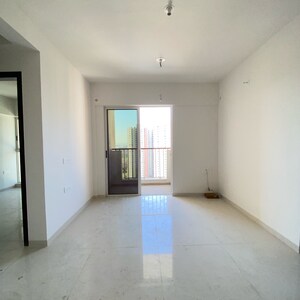 Room in 2 BHK Apartment at Lodha Codename Premier, Mangaon – for Sale