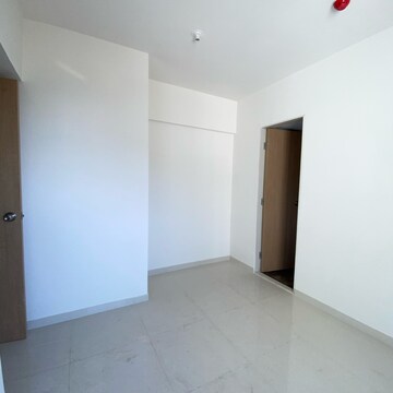 Room in 2 BHK Apartment at Lodha Codename Premier, Mangaon – for Sale