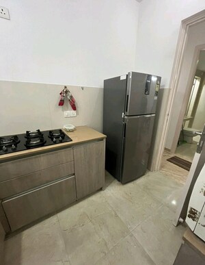 Kitchen in 1 BHK Apartment at Hiranandani Estate Rodas Enclave, Ghodbunder Road – for Rent