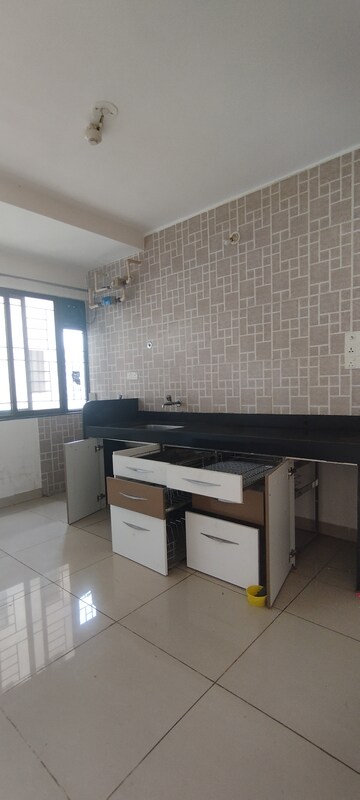 Kitchen in 3 BHK Apartment at Nanded City Asawari, Nanded – for Rent