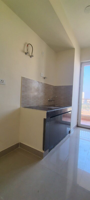 Kitchen in 2 BHK Apartment at Ansal Highland Park, Sector 103 – for Rent