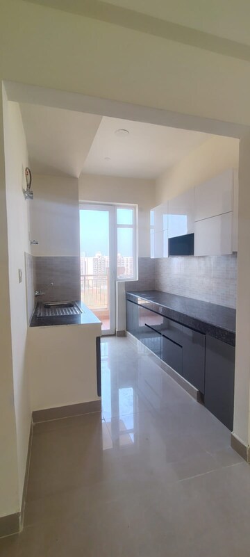 Kitchen in 2 BHK Apartment at Ansal Highland Park, Sector 103 – for Rent