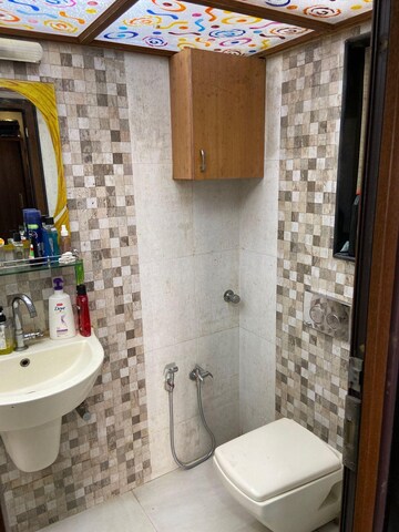 Bathroom in 4 BHK Apartment at Lok Upvan Apartment Phase 2, Vasant Vihar – for Rent