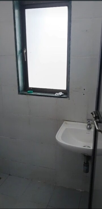 Bathroom in 1 BHK Apartment at Sukh sagar CHS Tilak Nagar, Tilak Nagar – for Rent