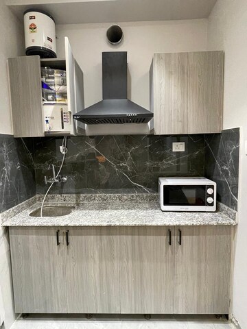 Kitchen in Studio Builder Floor at Sector 52 – for Rent