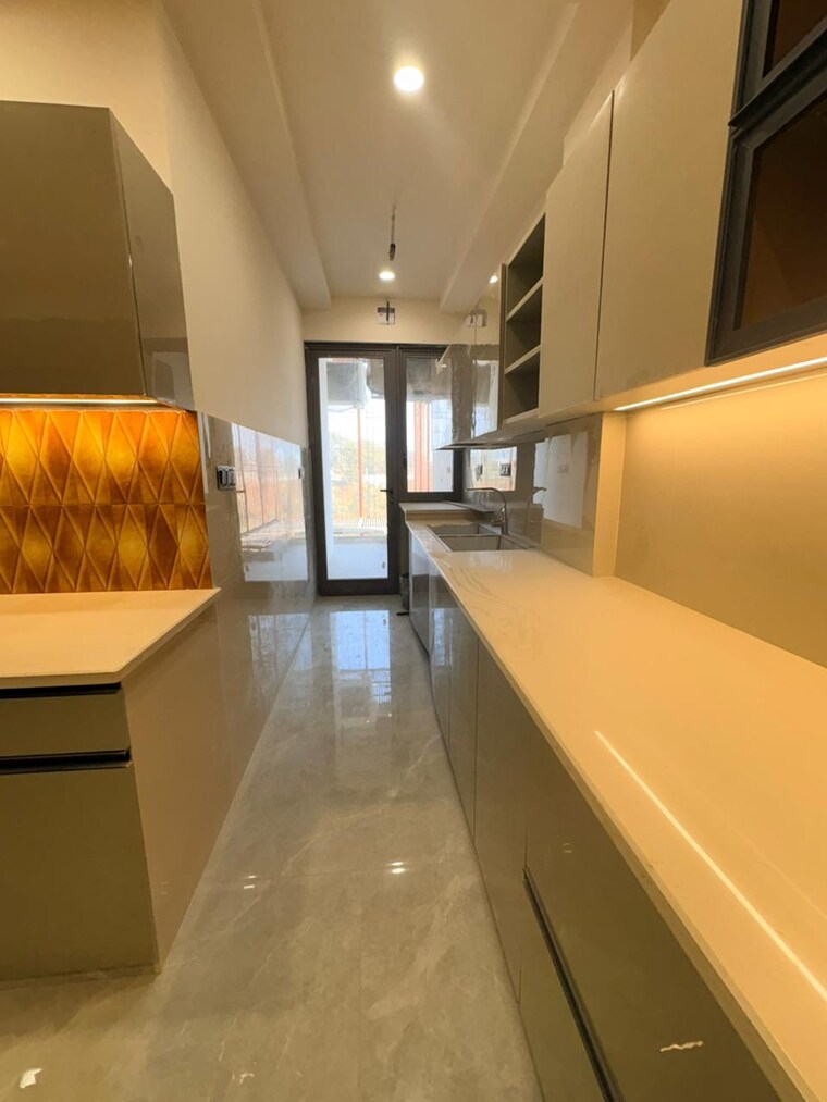 Kitchen, puri-aman-vilas 4 Bedroom 267 Sq.Yd. Apartment In Sector 89 Faridabad 9663049