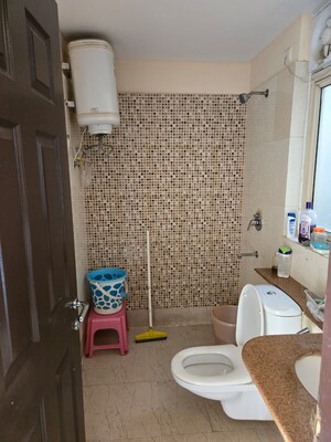 Bathroom in 3 BHK Apartment at Unitech Woodstock Floors, Sector 50 – for Rent