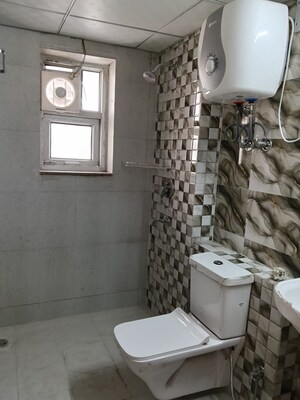 Bathroom in 3 BHK Apartment at Sector 19b Dwarka – for Rent