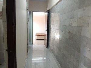 Building Lobby in 1 BHK Apartment at Tarun Bharat – for Rent