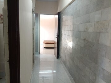Building Lobby in 1 BHK Apartment at Tarun Bharat – for Rent