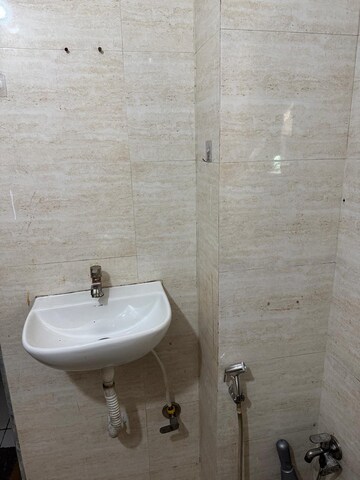 Bathroom in 1 BHK Apartment at Old Mhada Complex, Malad West – for Sale