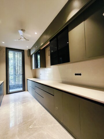 Kitchen in 4 BHK Builder Floor at Ansal Sushant Apartments, Sushant Lok I – for Sale