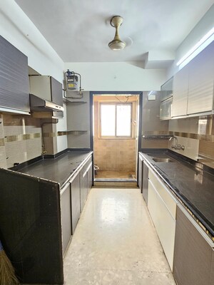 Kitchen in 1 BHK Apartment at Metropolis Rivera, Kasarvadavali – for Sale