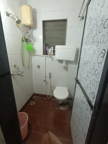 Bathroom in 2 BHK Apartment at Rose Terrace CHS, Jogeshwari West – for Rent