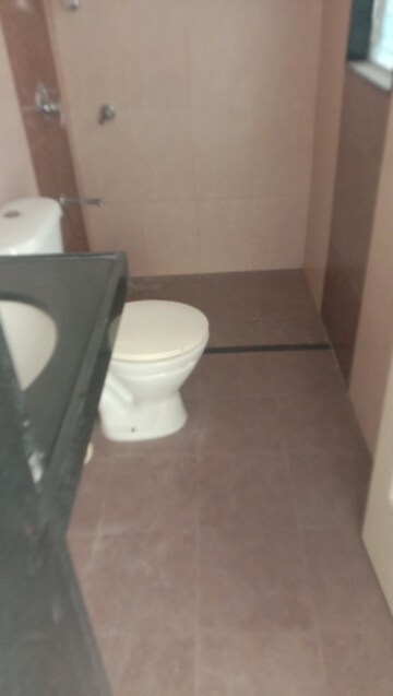 Bathroom in 2 BHK Apartment at Rama Celestial City, Ravet – for Rent