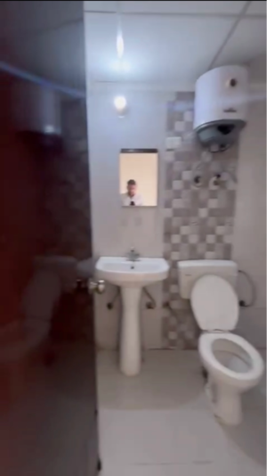 Bathroom in 2 BHK Apartment at Galaxy North Avenue, Gaur City 1 – for Sale
