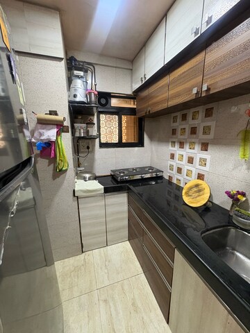 Kitchen in 1.5 BHK Apartment at Prakash Nagar – for Sale