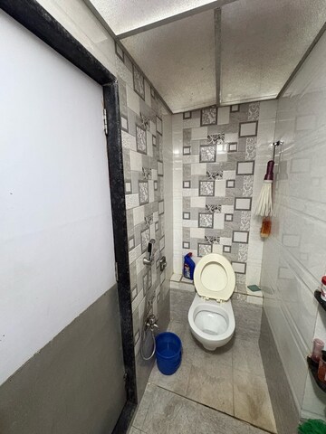 Bathroom in 1.5 BHK Apartment at Prakash Nagar – for Sale