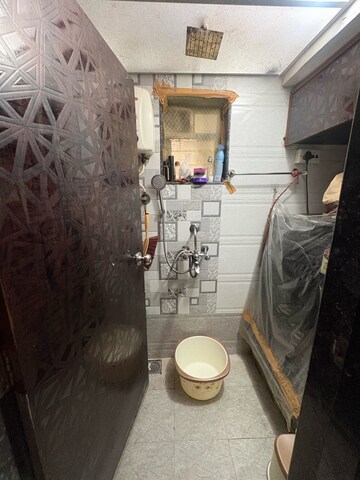 Bathroom in 1.5 BHK Apartment at Prakash Nagar – for Sale