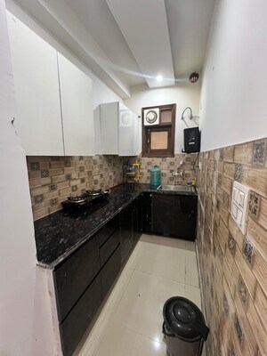 Kitchen in 2 BHK Builder Floor at Palam Vihar Extension – for Rent