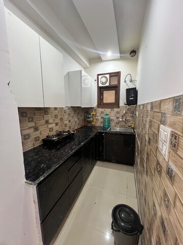 Kitchen in 2 BHK Builder Floor at Palam Vihar Extension – for Rent