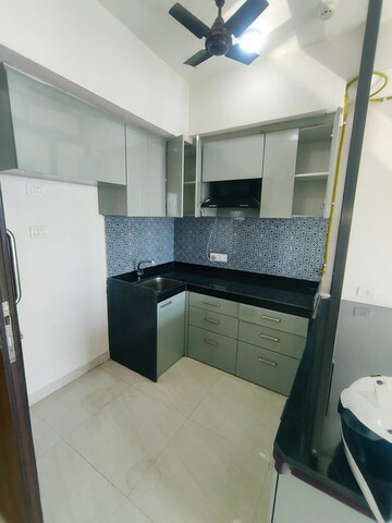 Kitchen in 1 BHK Apartment at Lodha Crown Quality Homes, Majiwada – for Rent