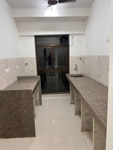 Kitchen in 2 BHK Apartment at Parinee Essence, Kandivali West – for Rent