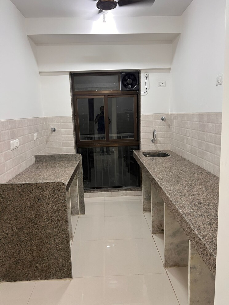 Kitchen, parinee-essence 2 Bedroom 558 Sq.Ft. Apartment In Kandivali West Mumbai 9663754