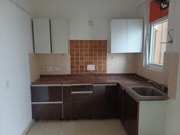 Kitchen in 4 BHK Apartment at Amrapali Zodiac, Sector 120 – for Rent