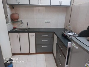 Kitchen in 2 BHK Apartment at Vashi Sector 15 – for Sale