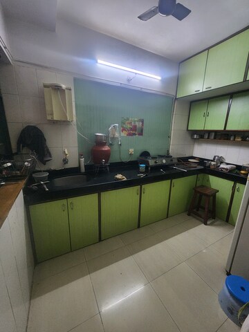 Kitchen in 2 BHK Apartment at Mulund Tulip CHS, Mulund West – for Sale