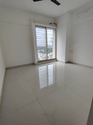 Room in 2 BHK Apartment at Shivam 19 Grand West, Thergaon – for Rent