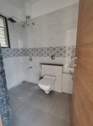 Bathroom in 2 BHK Apartment at Shivam 19 Grand West, Thergaon – for Rent