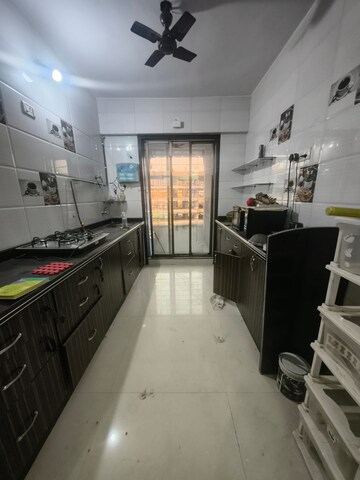Kitchen in 2 BHK Apartment at Shree Ambika Heritage, Kharghar – for Rent